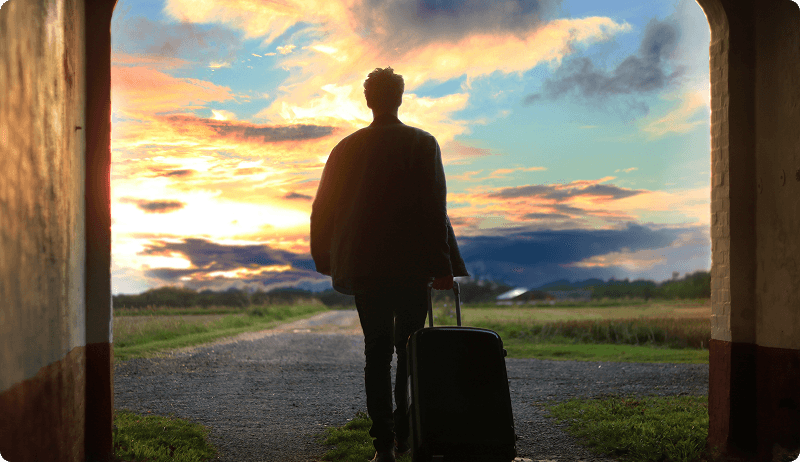 Traveler silhouette at sunset